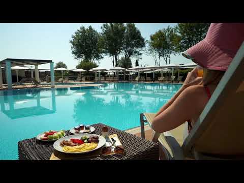 4 stjernet hotel direkte ved stranden med egen havvandspool tæt på Athen